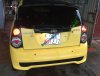 Cần bán lại xe Kia Morning AT sản xuất 2010, màu vàng, nhập khẩu
